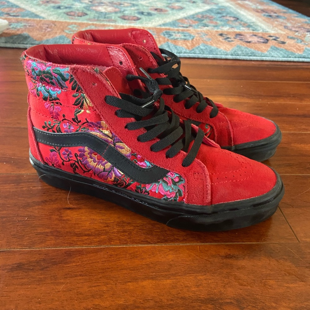 Red embroidered high top vans